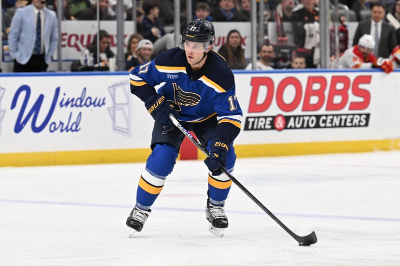 Jan 14, 2025; St. Louis, Missouri, USA; St. Louis Blues defenseman Cam Fowler (17) in action against the Calgary Flames in the second period at Enterprise Center. Mandatory Credit: Joe Puetz-Imagn Images