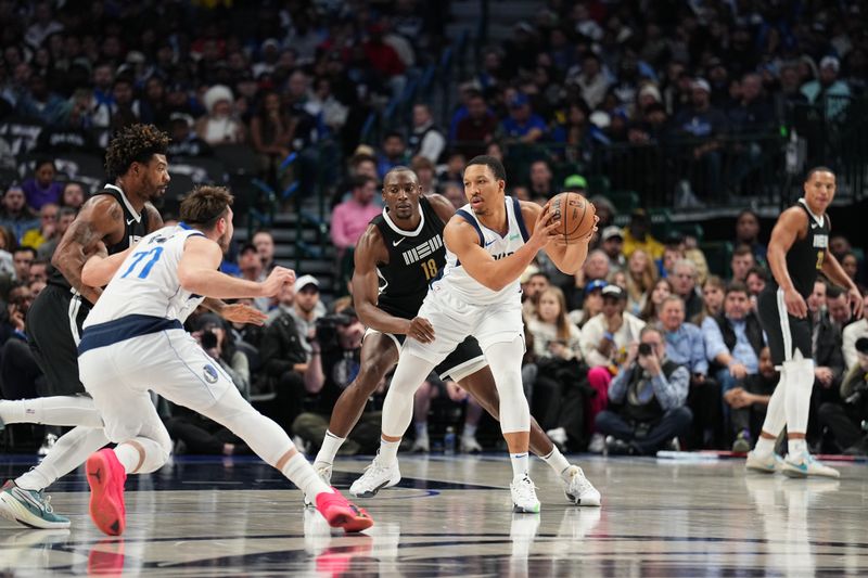 DALLAS, TX - JANUARY 9: Grant Williams #3 of the Dallas Mavericks handles the ball during the game against the Memphis Grizzlies on January 9, 2024 at the American Airlines Center in Dallas, Texas. NOTE TO USER: User expressly acknowledges and agrees that, by downloading and or using this photograph, User is consenting to the terms and conditions of the Getty Images License Agreement. Mandatory Copyright Notice: Copyright 2024 NBAE (Photo by Glenn James/NBAE via Getty Images)