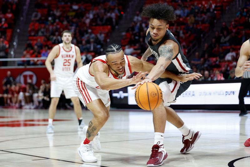 Jan 19, 2023; Salt Lake City, Utah, USA;  Utah Utes guard Marco Anthony (10) battles against Washington State Cougars forward DJ Rodman (11) in the second half at Jon M. Huntsman Center. Mandatory Credit: Jeffrey Swinger-USA TODAY Sports