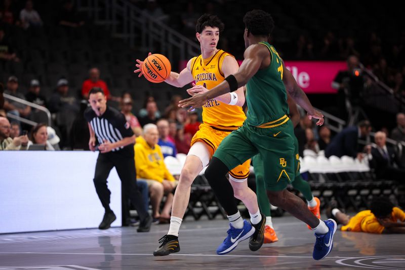 Mar 10, 2026; Kansas City, MO, USA; Arizona State Sun Devils forward Santiago Trouet (1) dribbles during the first half against the Baylor Bears at T-Mobile Center. Mandatory Credit: William Purnell-Imagn Images