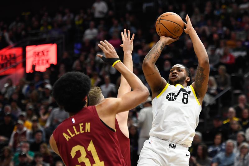 SALT LAKE CITY, UTAH - APRIL 02: Brice Sensabaugh #8 of the Utah Jazz shoots over Sam Merrill #5 of the Cleveland Cavaliers during the first half of a game at Delta Center on April 02, 2024 in Salt Lake City, Utah. NOTE TO USER: User expressly acknowledges and agrees that, by downloading and or using this photograph, User is consenting to the terms and conditions of the Getty Images License Agreement. (Photo by Alex Goodlett/Getty Images)