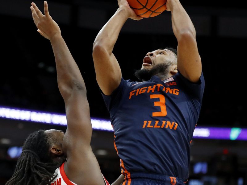 Feb 26, 2023; Columbus, Ohio, USA; Illinois Fighting Illini guard Jayden Epps (3) drives in for the score as Ohio State Buckeyes guard Bruce Thornton (2) defends during the first half at Value City Arena. Mandatory Credit: Joseph Maiorana-USA TODAY Sports