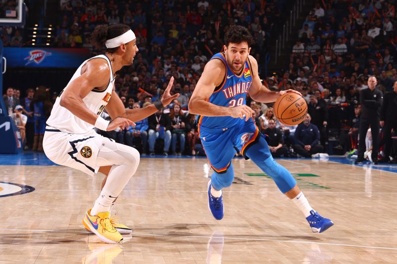 OKLAHOMA CITY, OK - JANUARY 31: Vasilije Micic #29 of the Oklahoma City Thunder dribbles the ball during the game against the Denver Nuggets on January 31, 2024 at Paycom Arena in Oklahoma City, Oklahoma. NOTE TO USER: User expressly acknowledges and agrees that, by downloading and or using this photograph, User is consenting to the terms and conditions of the Getty Images License Agreement. Mandatory Copyright Notice: Copyright 2024 NBAE (Photo by Zach Beeker/NBAE via Getty Images)