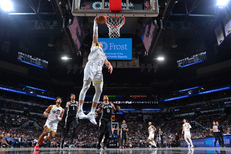 SAN ANTONIO, TX - NOVEMBER 9: Lauri Markkanen #23 of the Utah Jazz dunks the ball during the game against the San Antonio Spurs on November 9, 2024 at the Frost Bank Center in San Antonio, Texas. NOTE TO USER: User expressly acknowledges and agrees that, by downloading and or using this photograph, user is consenting to the terms and conditions of the Getty Images License Agreement. Mandatory Copyright Notice: Copyright 2024 NBAE (Photos by Michael Gonzales/NBAE via Getty Images)