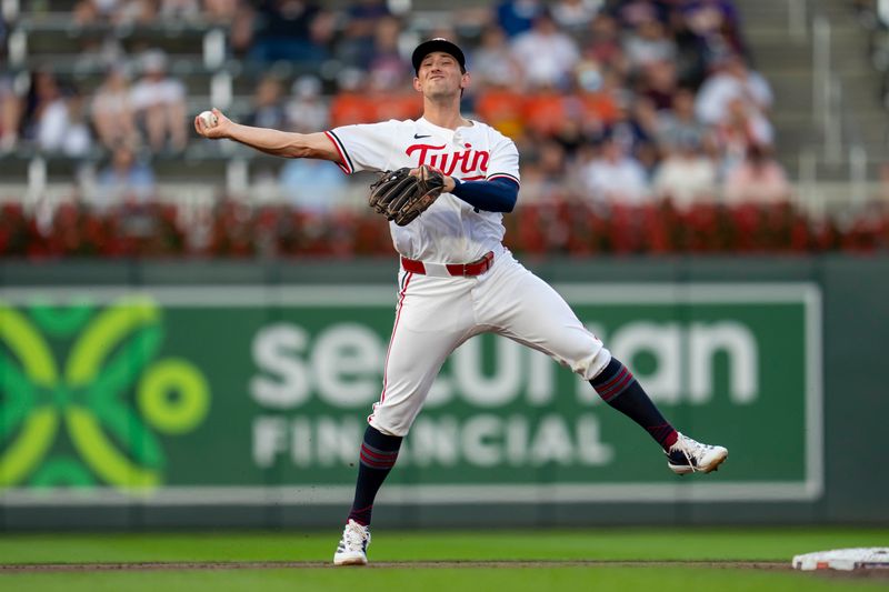 Sep 9, 2024; Minneapolis, Minnesota, USA; Minnesota Twins shortstop Brooks Lee (72) throws to first for an out against the Los Angeles Angels in the second inning at Target Field. Mandatory Credit: Jesse Johnson-Imagn Images