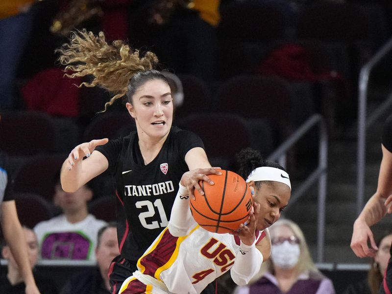 Jan 15, 2023; Los Angeles, California, USA; Southern California Trojans guard Kayla Williams (4) is fouled by Stanford Cardinal forward Brooke Demetre (21) in the second half at Galen Center.  USC defeated Stanford 55-46. Mandatory Credit: Kirby Lee-USA TODAY Sports