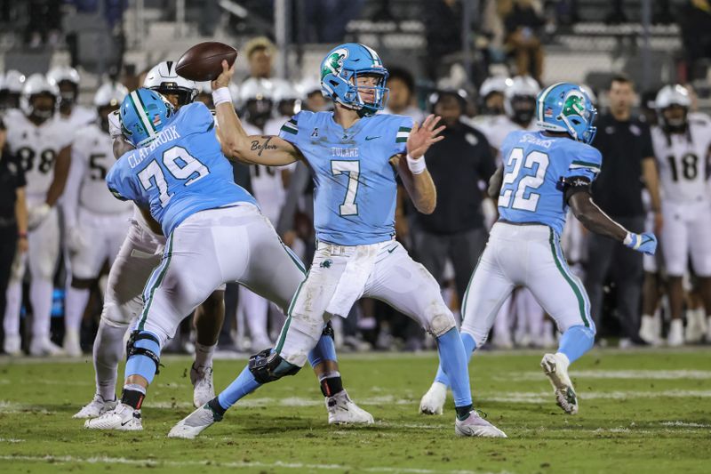 Nov 6, 2021; Orlando, Florida, USA; Tulane Green Wave quarterback Michael Pratt (7) throws a pass against the UCF Knights during the second half at Bounce House. Mandatory Credit: Mike Watters-USA TODAY Sports