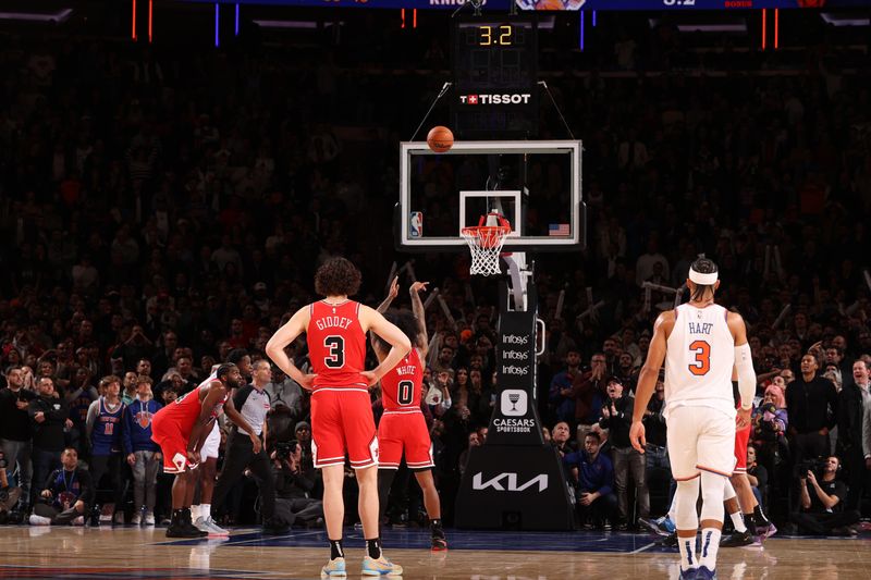 NEW YORK, NY - NOVEMBER 13: Coby White #0 of the Chicago Bulls makes the game winning free throw during the game against the New York Knicks on November 13, 2024 at Madison Square Garden in New York City, New York.  NOTE TO USER: User expressly acknowledges and agrees that, by downloading and or using this photograph, User is consenting to the terms and conditions of the Getty Images License Agreement. Mandatory Copyright Notice: Copyright 2024 NBAE  (Photo by Joe Murphy/NBAE via Getty Images)