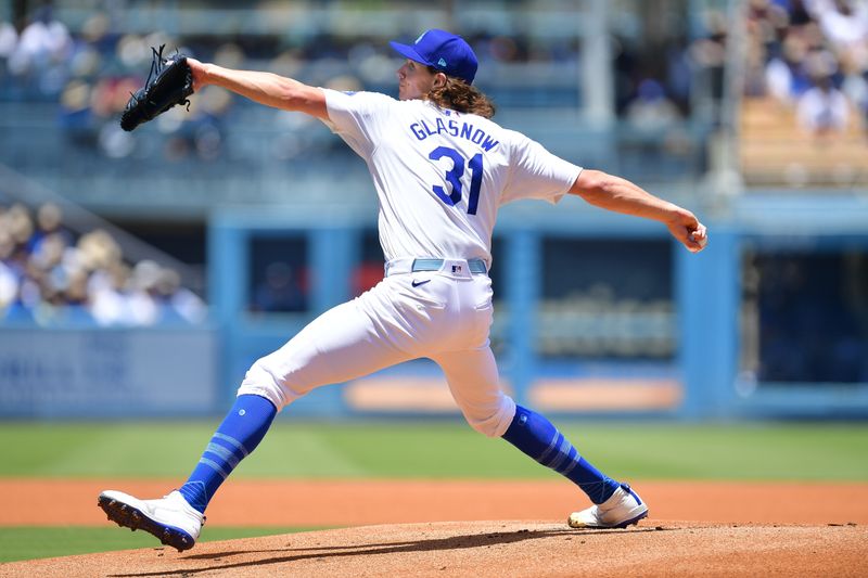 Jun 16, 2024; Los Angeles, California, USA; Los Angeles Dodgers pitcher Tyler Glasnow (31) throws against the Kansas City Royals during the first inning at Dodger Stadium. Mandatory Credit: Gary A. Vasquez-USA TODAY Sports