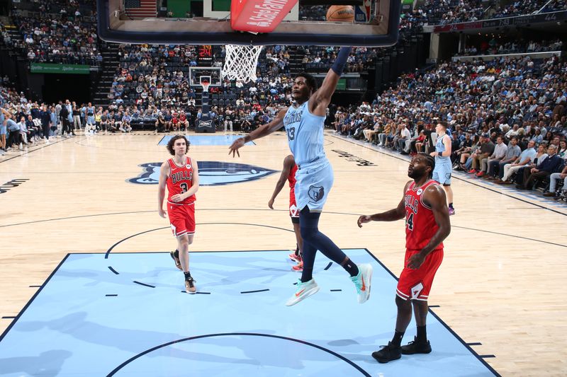 MEMPHIS, TN - OCTOBER 28: Jaren Jackson Jr. #13 of the Memphis Grizzlies dunks the ball during the game against the Chicago Bulls on October 28, 2024 at FedExForum in Memphis, Tennessee. NOTE TO USER: User expressly acknowledges and agrees that, by downloading and or using this photograph, User is consenting to the terms and conditions of the Getty Images License Agreement. Mandatory Copyright Notice: Copyright 2024 NBAE (Photo by Joe Murphy/NBAE via Getty Images)