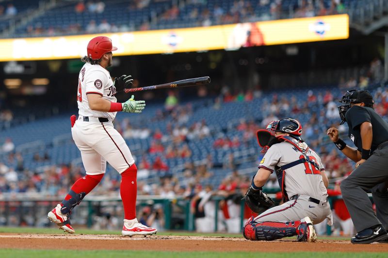 Sep 10, 2024; Washington, District of Columbia, USA; Washington Nationals designated hitter Andres Chaparro (19) is hit by a pitch against the Atlanta Braves during the first inning at Nationals Park. Mandatory Credit: Geoff Burke-Imagn Images