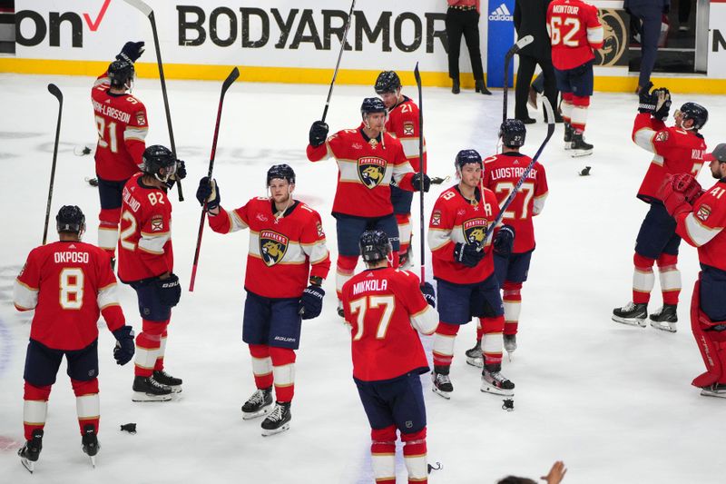 Apr 29, 2024; Sunrise, Florida, USA; Florida Panthers celebrate advancing to the second round of the 2024 Stanley Cup Playoffs with fans following a victory over the Tampa Bay Lightning at Amerant Bank Arena. Mandatory Credit: Jim Rassol-USA TODAY Sports