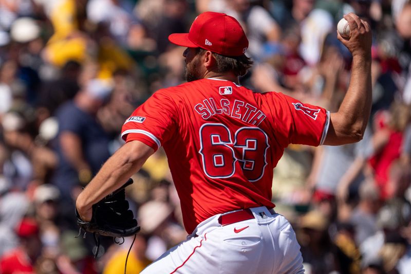 Mar 10, 2024; Tempe, Arizona, USA; Los Angeles Angeles pitcher Chase Silseth (63) on the mound in the second inning during a spring training game against the San Diego Padres at Tempe Diablo Stadium. Mandatory Credit: Allan Henry-USA TODAY Sports