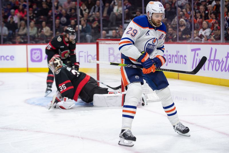 Nov 19, 2024; Ottawa, Ontario, CAN; Edmonton Oilers right wing Connor Brown (28) scores against Ottawa Senators goalie Linus Ullmark (35) in the second period at the Canadian Tire Centre. Mandatory Credit: Marc DesRosiers-Imagn Images