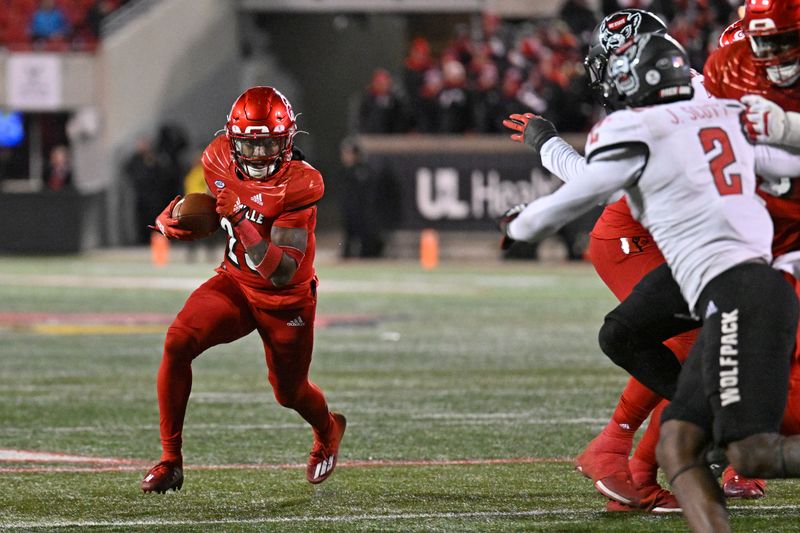 Nov 19, 2022; Louisville, Kentucky, USA;  Louisville Cardinals running back Jawhar Jordan (25) runs the ball against the North Carolina State Wolfpack during the second half at Cardinal Stadium. Louisville defeated North Carolina State 25-10. Mandatory Credit: Jamie Rhodes-USA TODAY Sports