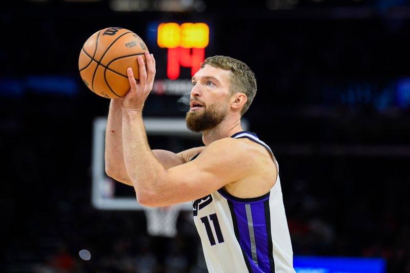 PHOENIX, ARIZONA - NOVEMBER 10: Domantas Sabonis #11 of the Sacramento Kings attempts a shot during the first half of the NBA game against the Phoenix Suns at Footprint Center on November 10, 2024 in Phoenix, Arizona. NOTE TO USER: User expressly acknowledges and agrees that, by downloading and/or using this photograph, user is consenting to the terms and conditions of the Getty Images License Agreement.  (Photo by Kelsey Grant/Getty Images)