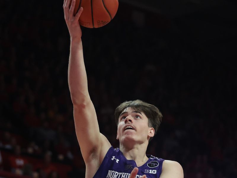 Mar 5, 2023; Piscataway, New Jersey, USA; Northwestern Wildcats guard Brooks Barnhizer (13) lays the ball up against the Rutgers Scarlet Knights during the first half at Jersey Mike's Arena. Mandatory Credit: Vincent Carchietta-USA TODAY Sports