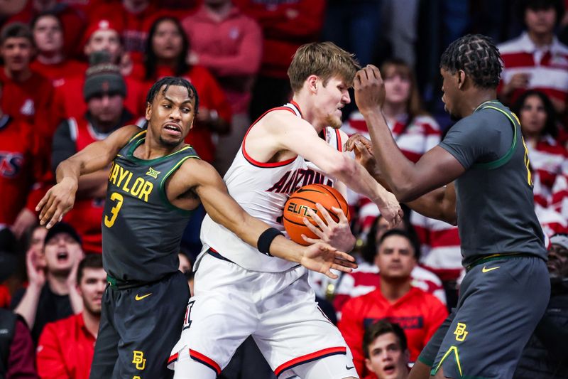 Jan 14, 2025; Tucson, Arizona, USA; Baylor Bears guard Jeremy Roach (3) and forward Josh Ojianwuna (17) both attempt to take the ball from Arizona Wildcats Henri Veesaar (13) during the first half at McKale Center. Mandatory Credit: Aryanna Frank-Imagn Images