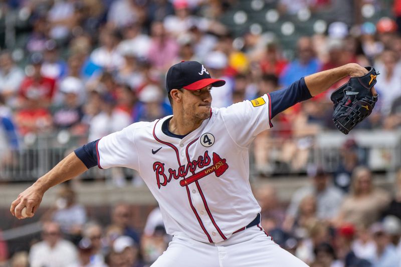 Jun 2, 2024; Cumberland, Georgia, USA; Atlanta Braves pitcher Charlie Morton (50) pitches the ball against Oakland Athletics during the first inning at Truist Park. Mandatory Credit: Jordan Godfree-USA TODAY Sports