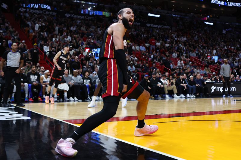 MIAMI, FLORIDA - FEBRUARY 06: Caleb Martin #16 of the Miami Heat reacts after making a basket against the Orlando Magic during the third quarter at Kaseya Center on February 06, 2024 in Miami, Florida. NOTE TO USER: User expressly acknowledges and agrees that, by downloading and or using this photograph, User is consenting to the terms and conditions of the Getty Images License Agreement. (Photo by Megan Briggs/Getty Images)