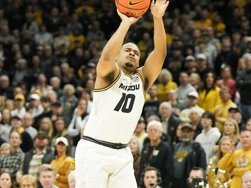 Dec 3, 2023; Columbia, Missouri, USA; Missouri Tigers guard Nick Honor (10) shoots a three point basket against the Wichita State Shockers during the first half at Mizzou Arena. Mandatory Credit: Denny Medley-USA TODAY Sports