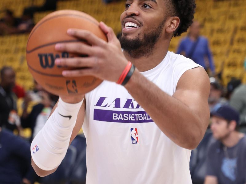 MEMPHIS, TN - APRIL 19: Troy Brown Jr. #7 of the Los Angeles Lakers smiles before the game against the Memphis Grizzlies during Round One Game Two of the 2023 NBA Playoffs on April 19, 2023 at FedExForum in Memphis, Tennessee. NOTE TO USER: User expressly acknowledges and agrees that, by downloading and or using this photograph, User is consenting to the terms and conditions of the Getty Images License Agreement. Mandatory Copyright Notice: Copyright 2023 NBAE (Photo by Joe Murphy/NBAE via Getty Images)