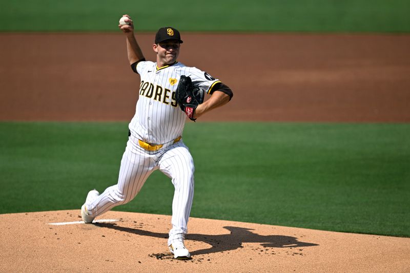 Jul 10, 2024; San Diego, California, USA; San Diego Padres starting pitcher Michael King (34) pitches against the Seattle Mariners during the first inning at Petco Park. Mandatory Credit: Orlando Ramirez-USA TODAY Sports