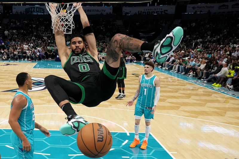 CHARLOTTE, NORTH CAROLINA - NOVEMBER 02: Jayson Tatum #0 of the Boston Celtics dunks against the Charlotte Hornets during the second half of the game at Spectrum Center on November 02, 2024 in Charlotte, North Carolina. NOTE TO USER: User expressly acknowledges and agrees that, by downloading and or using this photograph, User is consenting to the terms and conditions of the Getty Images License Agreement.  (Photo by Grant Halverson/Getty Images)