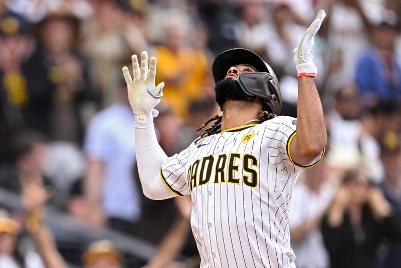 Sep 18, 2024; San Diego, California, USA; San Diego Padres designated hitter Fernando Tatis Jr. (23) celebrates after hitting a home run against the Houston Astros during the eighth inning at Petco Park. Mandatory Credit: Orlando Ramirez-Imagn Images