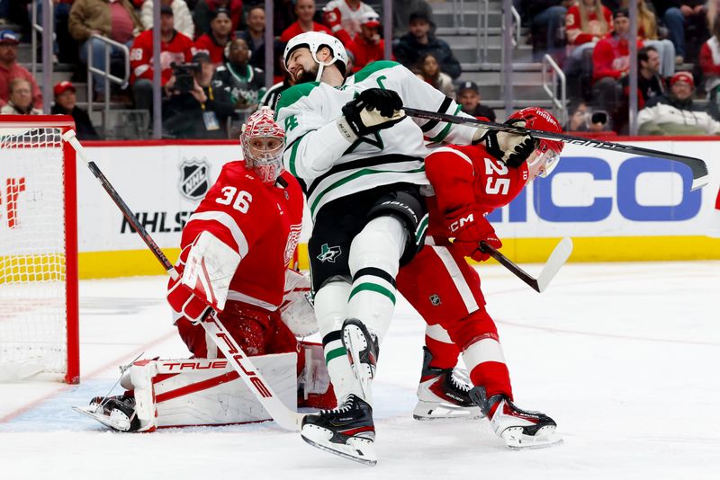 Dec 23, 2025; Detroit, Michigan, USA;  Dallas Stars left wing Jamie Benn (14) tries to screen Detroit Red Wings goaltender John Gibson (36) in the third period at Little Caesars Arena. Mandatory Credit: Rick Osentoski-Imagn Images