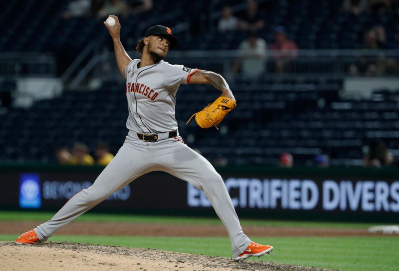 May 22, 2024; Pittsburgh, Pennsylvania, USA;  San Francisco Giants relief pitcher Camilo Doval (75) pitches against the Pittsburgh Pirates during the tenth inning at PNC Park. The Giants won 9-5 in ten innings. Mandatory Credit: Charles LeClaire-USA TODAY Sports