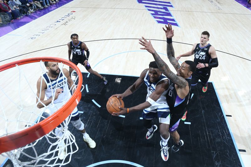 SALT LAKE CITY, UT - JANUARY 30:  Anthony Edwards #5 of the Minnesota Timberwolves drives to the basket during the game against the Utah Jazz on January 30, 2025 at Delta Center in Salt Lake City, Utah. NOTE TO USER: User expressly acknowledges and agrees that, by downloading and or using this Photograph, User is consenting to the terms and conditions of the Getty Images License Agreement. Mandatory Copyright Notice: Copyright 2025 NBAE (Photo by Melissa Majchrzak/NBAE via Getty Images)