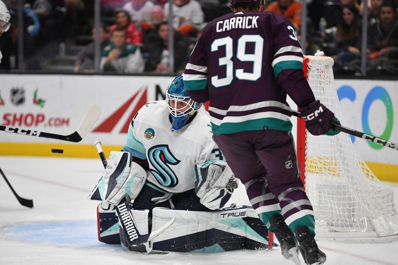 Dec 23, 2023; Anaheim, California, USA; Seattle Kraken goaltender Joey Daccord (35) defends the goal against the Anaheim Ducks during the second period at Honda Center. Mandatory Credit: Gary A. Vasquez-USA TODAY Sports