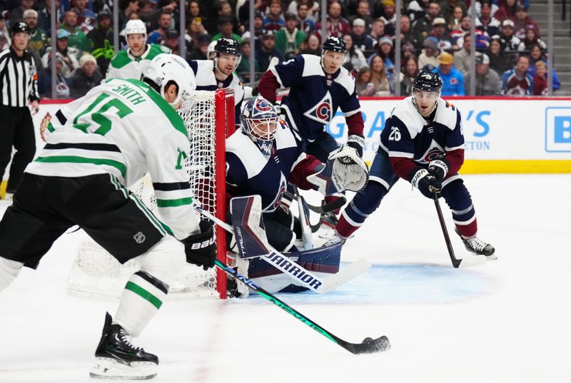 Apr 7, 2024; Denver, Colorado, USA; Colorado Avalanche defenseman Sean Walker (26) and goaltender Alexandar Georgiev (40) defend on Dallas Stars center Craig Smith (15) in the first period at Ball Arena. Mandatory Credit: Ron Chenoy-USA TODAY Sports