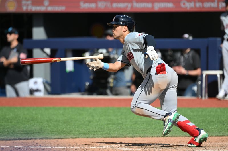 Jun 16, 2024; Toronto, Ontario, CAN;  Cleveland Guardians left fielder Steven Kwan (38) hits a single against the Toronto Blue Jays in the ninth inning at Rogers Centre. Mandatory Credit: Dan Hamilton-USA TODAY Sports