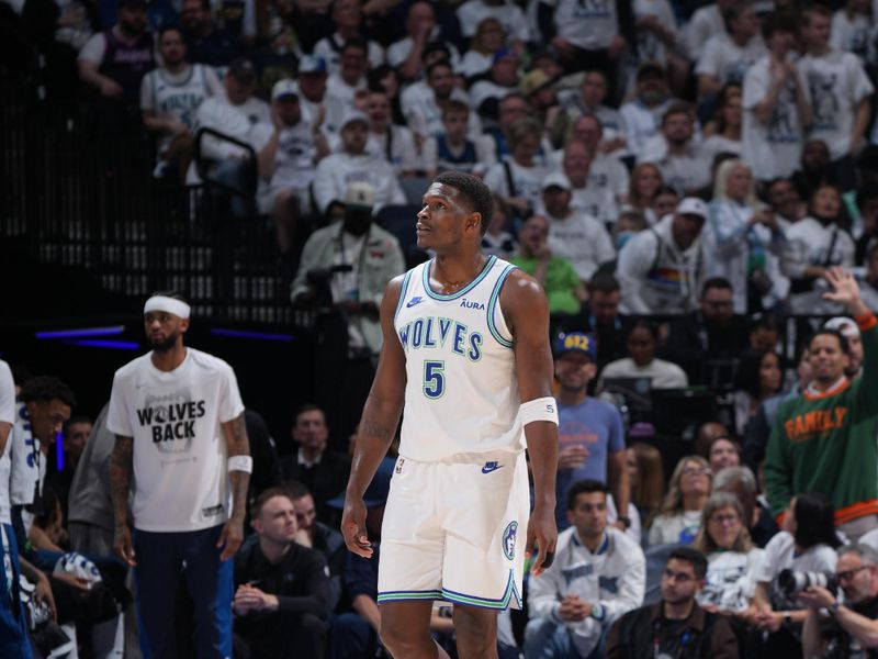 MINNEAPOLIS, MN -  APRIL 23: Anthony Edwards #5 of the Minnesota Timberwolves looks on during the game against the Phoenix Suns during Round One Game Two of the 2024 NBA Playoffs on April 23, 2024 at Target Center in Minneapolis, Minnesota. NOTE TO USER: User expressly acknowledges and agrees that, by downloading and or using this Photograph, user is consenting to the terms and conditions of the Getty Images License Agreement. Mandatory Copyright Notice: Copyright 2024 NBAE (Photo by Jordan Johnson/NBAE via Getty Images)