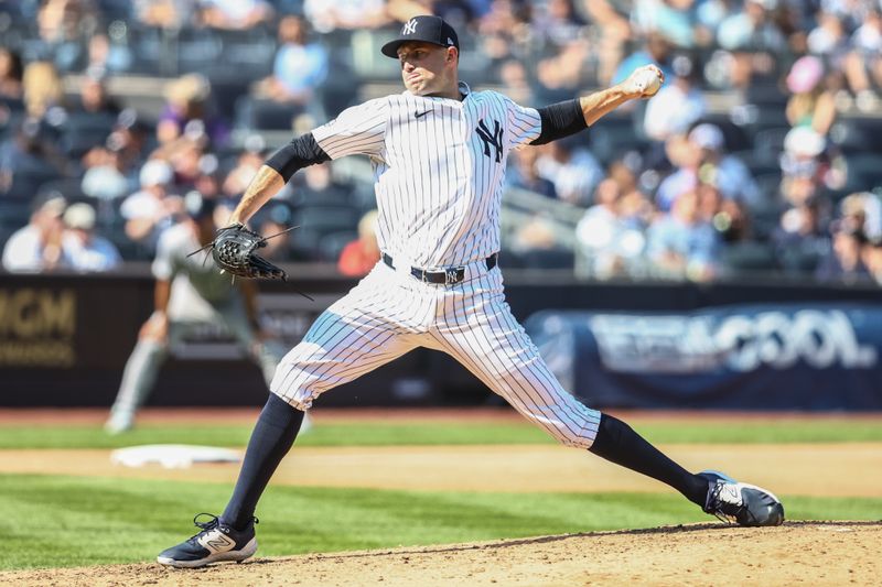 Aug 24, 2024; Bronx, New York, USA;  New York Yankees pitcher Tim Mayza (58) pitches in the fifth inning against the Colorado Rockies at Yankee Stadium. Mandatory Credit: Wendell Cruz-USA TODAY Sports