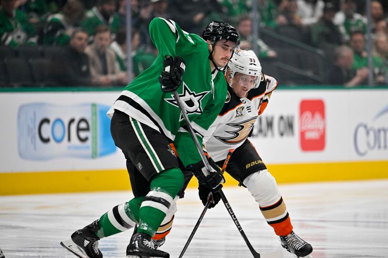 Jan 25, 2024; Dallas, Texas, USA; Dallas Stars left wing Mason Marchment (27) and Anaheim Ducks right wing Jakob Silfverberg (33) battle for position on the face-off circle during the first period at the American Airlines Center. Mandatory Credit: Jerome Miron-USA TODAY Sports