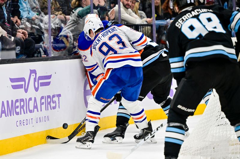 Nov 29, 2024; Salt Lake City, Utah, USA; Edmonton Oilers center Ryan Nugent-Hopkins (93) stops the puck against the Utah Hockey Club during the third period at the Delta Center. Mandatory Credit: Christopher Creveling-Imagn Images