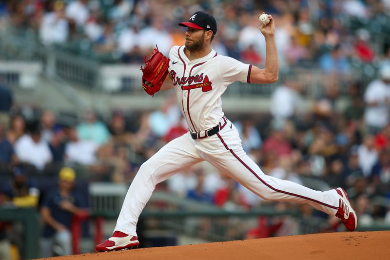 Aug 7, 2024; Atlanta, Georgia, USA; Atlanta Braves starting pitcher Chris Sale (51) throws against the Milwaukee Brewers in the first inning at Truist Park. Mandatory Credit: Brett Davis-USA TODAY Sports
