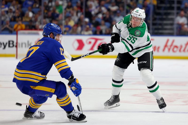 Oct 22, 2024; Buffalo, New York, USA;  Buffalo Sabres left wing Jason Zucker (17) tries to block a shot by Dallas Stars defenseman Thomas Harley (55) during the third period at KeyBank Center. Mandatory Credit: Timothy T. Ludwig-Imagn Images