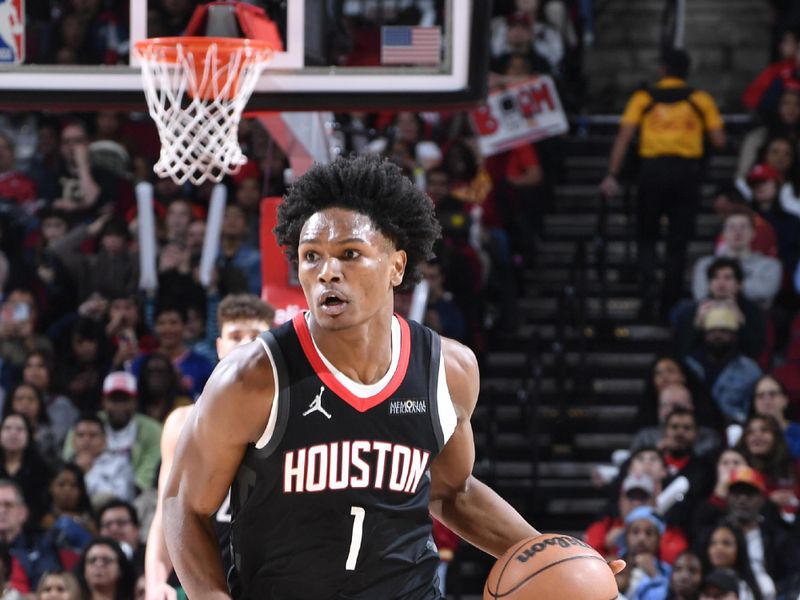 HOUSTON, TX - JANUARY 13:   Amen Thompson #1 of the Houston Rockets dribbles the ball during the game against the Memphis Grizzlies on January 13, 2025 at the Toyota Center in Houston, Texas. NOTE TO USER: User expressly acknowledges and agrees that, by downloading and or using this photograph, User is consenting to the terms and conditions of the Getty Images License Agreement. Mandatory Copyright Notice: Copyright 2024 NBAE (Photo by Logan Riely/NBAE via Getty Images)