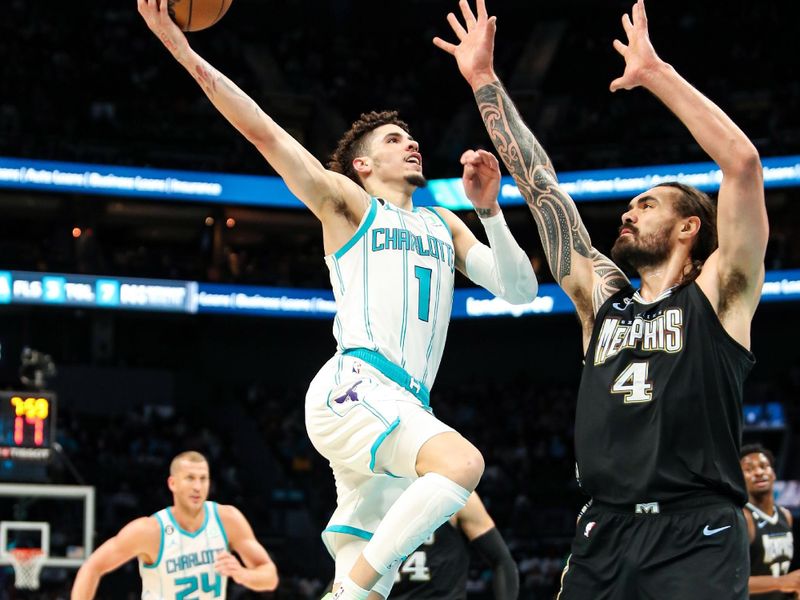 CHARLOTTE, NC - JANUARY 4: LaMelo Ball #1 of the Charlotte Hornets drives to the basket during the game against the Memphis Grizzlies on January 4, 2023 at Spectrum Center in Charlotte, North Carolina. NOTE TO USER: User expressly acknowledges and agrees that, by downloading and or using this photograph, User is consenting to the terms and conditions of the Getty Images License Agreement. Mandatory Copyright Notice: Copyright 2023 NBAE (Photo by Brock Williams-Smith/NBAE via Getty Images)