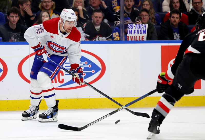 Dec 9, 2023; Buffalo, New York, USA;  Montreal Canadiens left wing Tanner Pearson (70) looks to make a pass during the first period against the Buffalo Sabres at KeyBank Center. Mandatory Credit: Timothy T. Ludwig-USA TODAY Sports