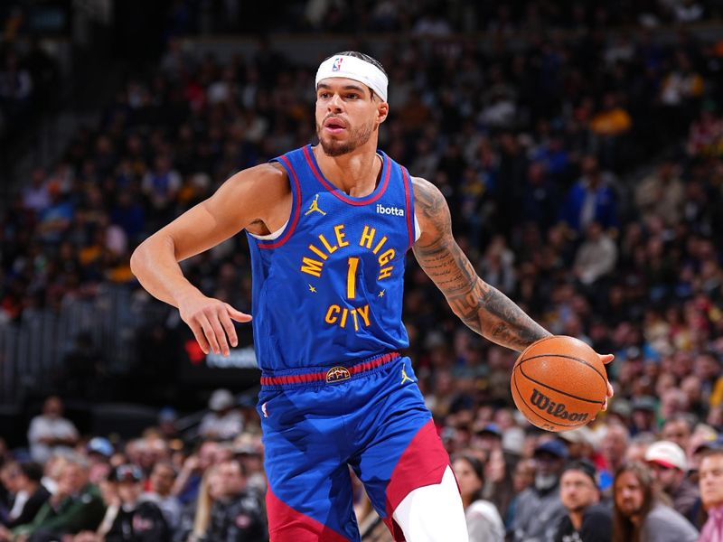 DENVER, CO - NOVEMBER 8: Michael Porter Jr. #1 of the Denver Nuggets dribbles the ball during the game against the Miami Heat on November 8, 2024 at Ball Arena in Denver, Colorado. NOTE TO USER: User expressly acknowledges and agrees that, by downloading and/or using this Photograph, user is consenting to the terms and conditions of the Getty Images License Agreement. Mandatory Copyright Notice: Copyright 2024 NBAE (Photo by Garrett Ellwood/NBAE via Getty Images)