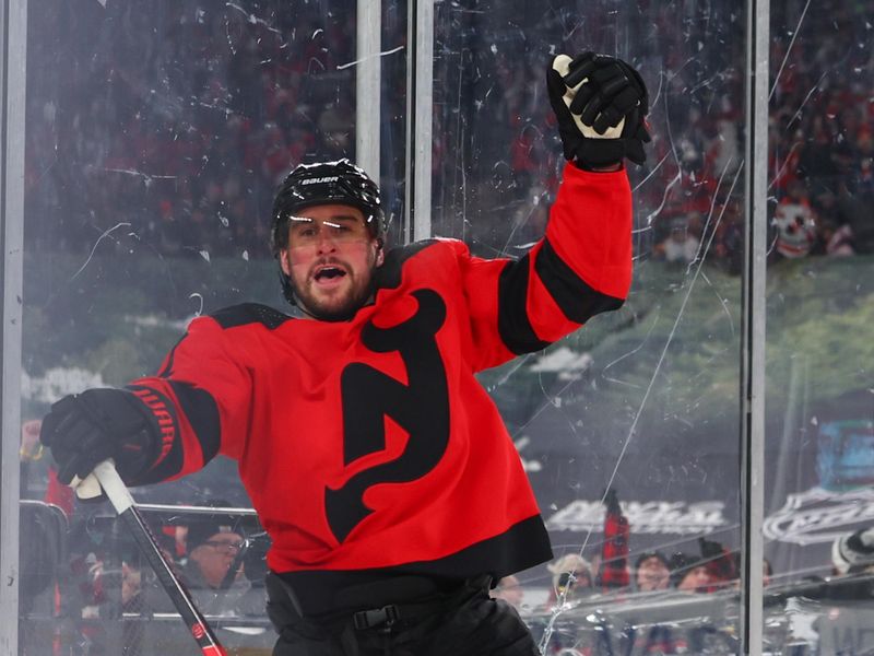 Feb 17, 2024; East Rutherford, New Jersey, USA; New Jersey Devils defenseman Brendan Smith (2) celebrates his goal against the Philadelphia Flyers during the second period in a Stadium Series ice hockey game at MetLife Stadium. Mandatory Credit: Ed Mulholland-USA TODAY Sports