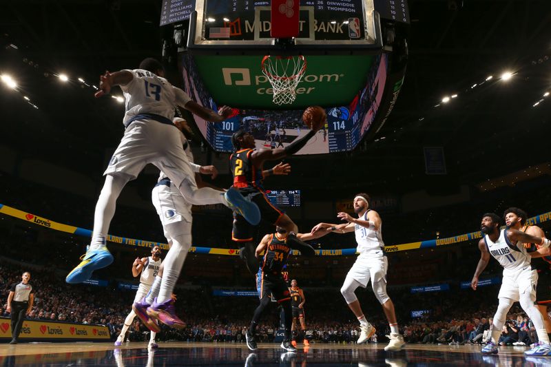 OKLAHOMA CITY, OK - NOVEMBER 17: Shai Gilgeous-Alexander #2 of the Oklahoma City Thunder drives to the basket during the game against the Dallas Mavericks on November 17, 2024 at Paycom Center in Oklahoma City, Oklahoma. NOTE TO USER: User expressly acknowledges and agrees that, by downloading and or using this photograph, User is consenting to the terms and conditions of the Getty Images License Agreement. Mandatory Copyright Notice: Copyright 2024 NBAE (Photo by Zach Beeker/NBAE via Getty Images)