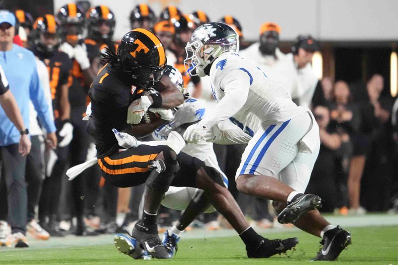 Nov 2, 2024; Knoxville, Tennessee, USA; Tennessee Volunteers wide receiver Dont'e Thornton Jr. (1) runs the ball against the Kentucky Wildcats during the first half at Neyland Stadium. Mandatory Credit: Caitie McMekin/USA TODAY Network via Imagn Images
