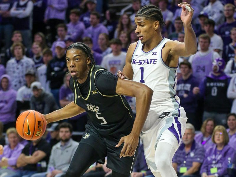 Jan 6, 2024; Manhattan, Kansas, USA; UCF Knights forward Omar Payne (5) dribbles against Kansas State Wildcats forward David N'Guessan (1) during the second half at Bramlage Coliseum. Mandatory Credit: Scott Sewell-USA TODAY Sports