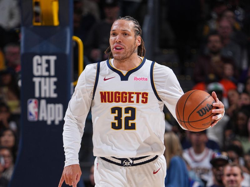 DENVER, CO - OCTOBER 13: Aaron Gordon #32 of the Denver Nuggets dribbles the ball during the game against the Phoenix Suns on October 13, 2024 at Ball Arena in Denver, Colorado. NOTE TO USER: User expressly acknowledges and agrees that, by downloading and/or using this Photograph, user is consenting to the terms and conditions of the Getty Images License Agreement. Mandatory Copyright Notice: Copyright 2024 NBAE (Photo by Garrett Ellwood/NBAE via Getty Images)